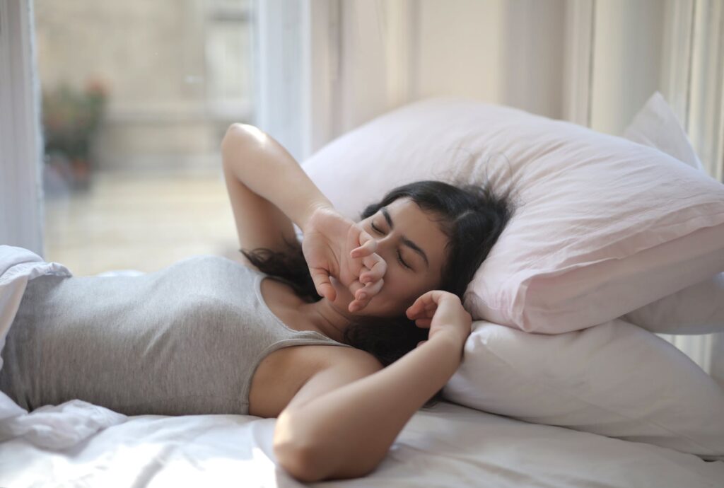 A girl demonstrating back sleeping