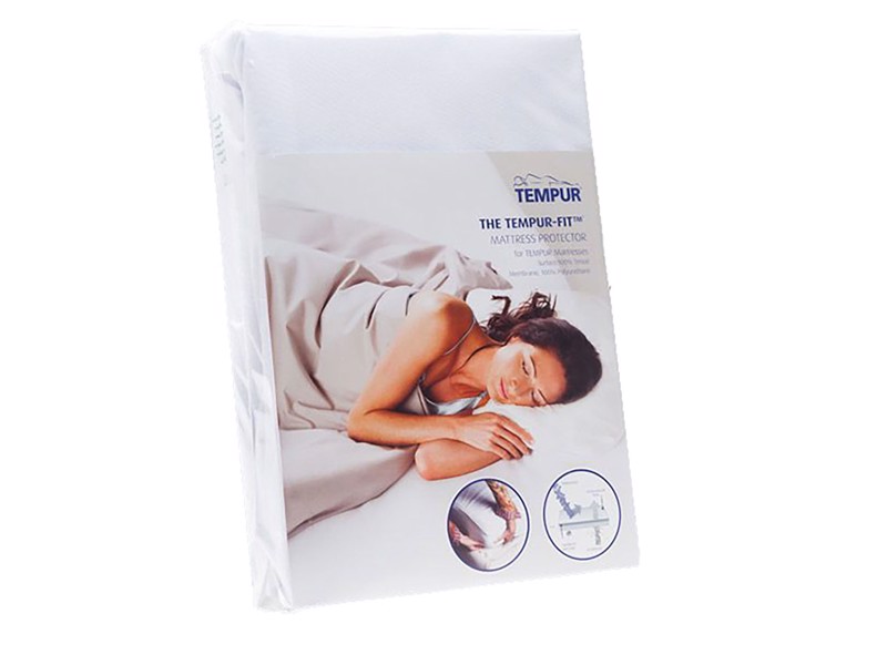 White mattress protector in a cardboard sleeve cover. A lady is asleep in the cover photo.