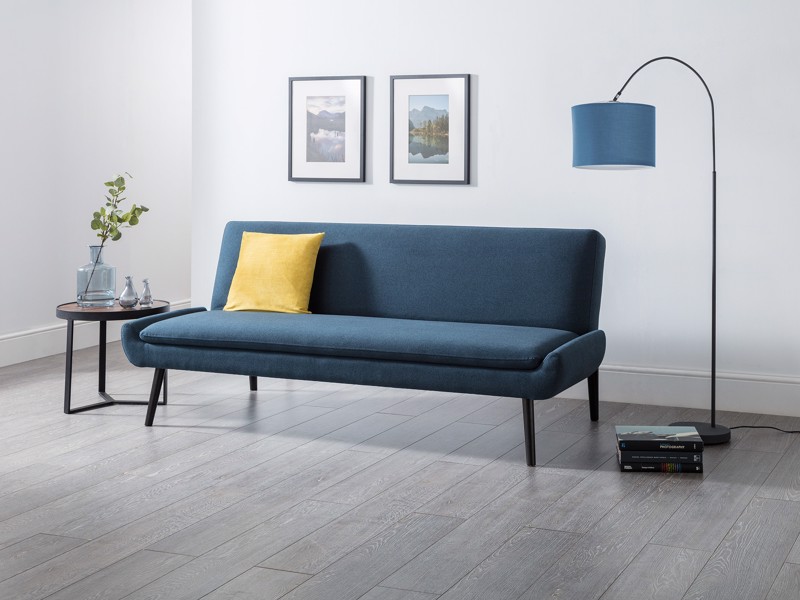A blue click-clack sofa bed in the settee position
