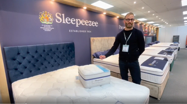 Bed and Mattress Expert at Sleepeezee showing a mattress