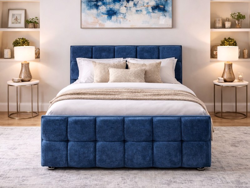 upholstered bed frame with quilted blue velvet fabric